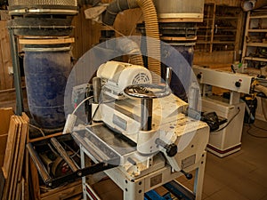 Various joinery machines for processing wood in a carpentry workshop