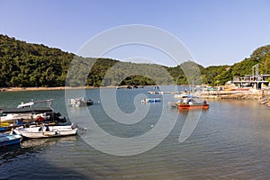 Various Junks park at harbor or small port in villages in Sai Kung, Hong Kong