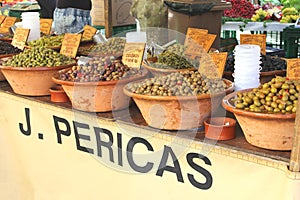 Collection of Mediterranean olives at a rustic market, Mallorca, Spain