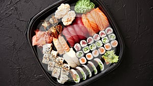 Various kinds of sushi on plate or platter set