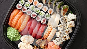 Various kinds of sushi on plate or platter set