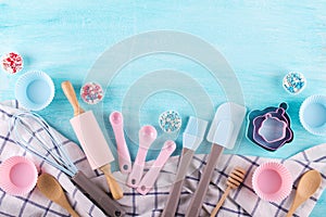 Various kitchen baking utensils. Flat lay. Mockup for recipe on blue background.