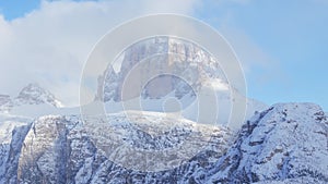 Various landscapes of Italian Dolomite region under snowfall