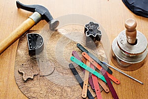Various leather processing tools and utensils used to produce leather items