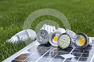 Various LED lamps on photovoltaic cells and CFL in