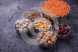 Various legumes. Chickpeas, red lentils, black lentils, yellow p