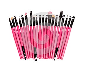 Various makeup brushes isolated over white background