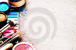 Various makeup products on dark background. Beauty and fashion c