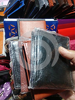 Various Male wallets selling by street vendor