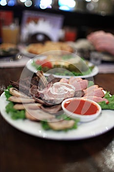 Various meat slices with dips