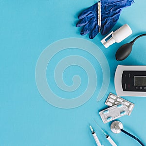 various medical equipments blue backdrop. High quality photo