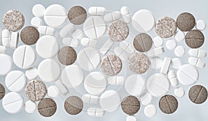 Various medical pills on white background