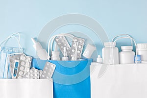 Various medicines, medical and pharmaceutical products in paper bags. Copy space