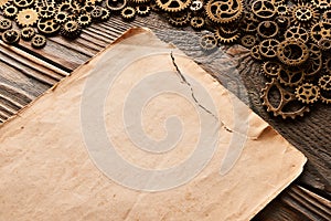 Various metal cogwheels and blank paper