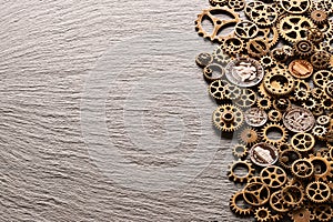 Various metal cogwheels with USA coins