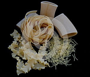 Pasta on black background. Tradotional food concept photo