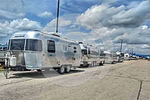 Line of Airstream travel trailer campers