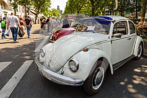 Various modifications Volkswagen Beetle standing in a row.