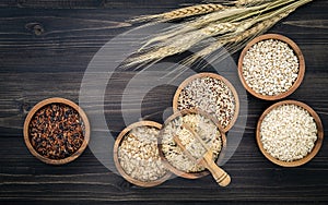 Various natural organic cereal and whole grains seed in wooden bowl for healthy food ingredient product concept