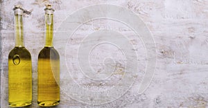 Various oil glass bottles on wooden background