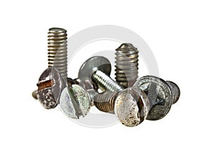 Various old screws on white background