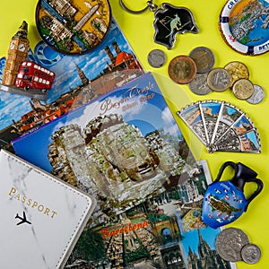 various passports and souvenir magnets from several world country