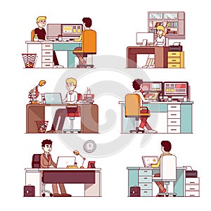 Various business people working sitting at desks