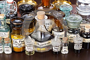 Various pharmacy bottles of homeopathic medicine photo