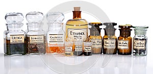 Various pharmacy bottles of homeopathic medicine photo