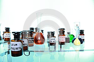 Various pharmacy medicine bottles isolated photo