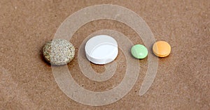 Various pills, tablettes,capsules on whte background