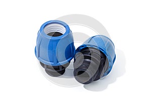 Various plastic fittings for polypropylene pipes on a white background - Image