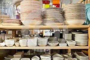 Various plates for sale in tableware department of store photo