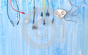 Various plugs,connectors and cables on grungy background, connectivity, connection metaphor,