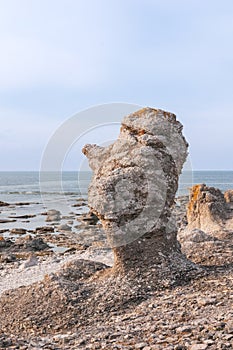 Head-shaped rock formation on the island of FÃÂ¥rÃÂ¶, Langhammars RaukomrÃÂ¥de, Sweden, Gotland, Europe photo
