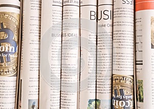 Various rolled newspapers, closeup