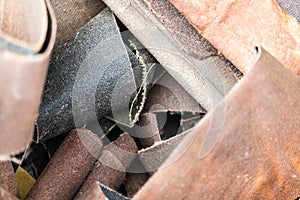 Various sandpaper grit in a bulk closeup