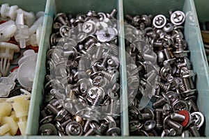 Various screws for assembling computer sets. Accessories for mechanic electronics