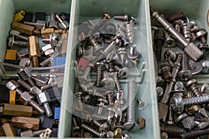 Various screws for assembling computer sets. Accessories for mechanic electronics