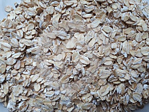 Various seeds. Picturesquely laid out on the table in a different order flakes. photo