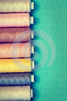 Various Sewing Accessories: colored threads, scissors