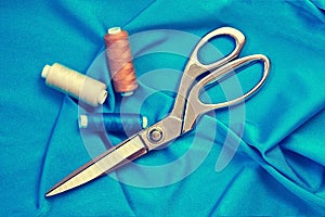 Various Sewing Accessories: colored threads, scissors