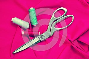 Various Sewing Accessories: colored threads, scissors