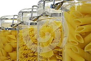 Various shapes of pasta in jars