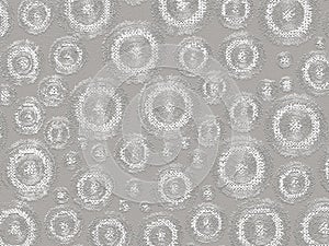 various size of white embossed round pattern on gray concrete floor photo