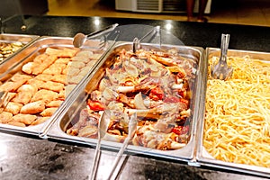 various snacks and dishes on a table at the buffet