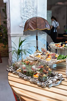 various snacks and drinks on the table at the event