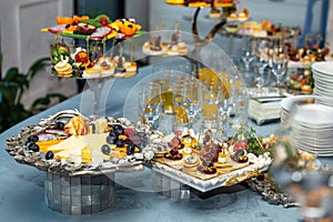 various snacks and drinks on the table at the event