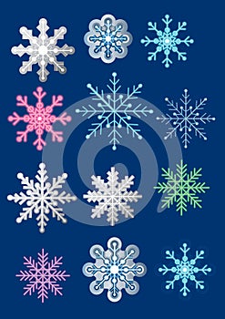 Various snowflake designs on a dark blue background