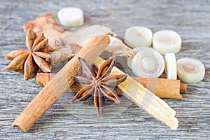 Various spices and Lemongrass on wooden background - Spice for h
